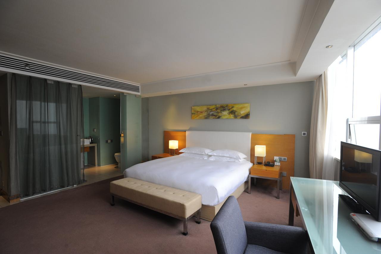 Tang'S Hotel Чънду Екстериор снимка