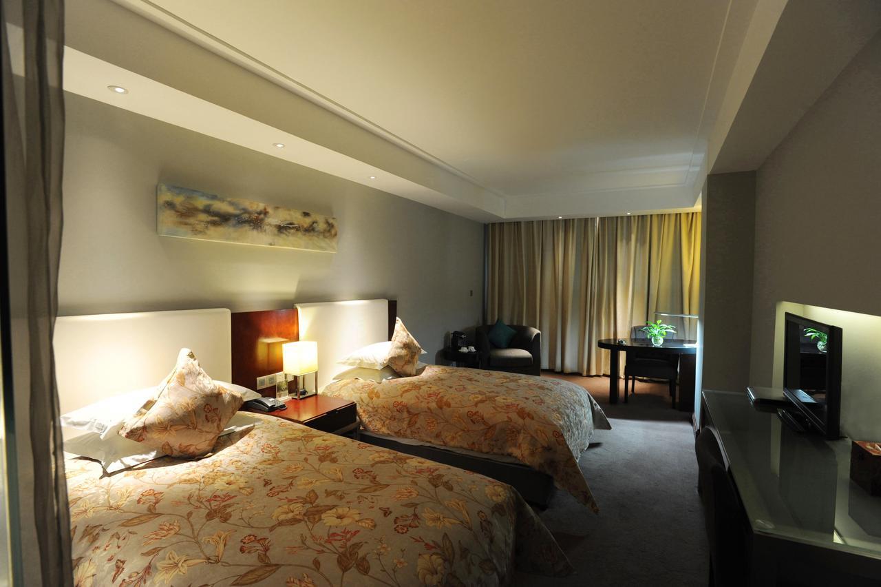 Tang'S Hotel Чънду Екстериор снимка